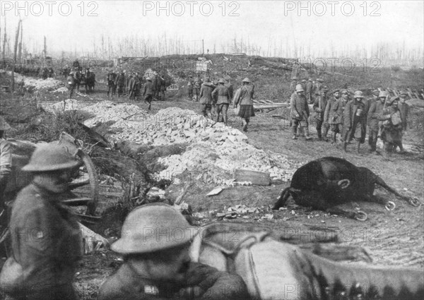 Allied troops and German prisoners at the Menin Road, near Ypres, Belgium, 30 October, 1917. Artist: Unknown