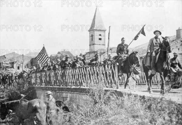 American soldiers entering the village of Nonsard, near Saint-Mihiel, France, 12-15 September 1918. Artist: Unknown