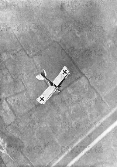 A German Aviatik aircraft photographed in flight by a Belgian aviator, Ypres, Belgium, 1916. Artist: Unknown