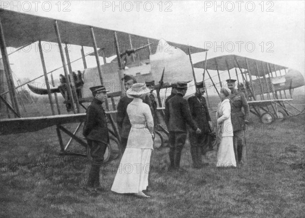 Queen Elisabeth of Belgium visiting Allied pilots, c1915. Artist: Unknown