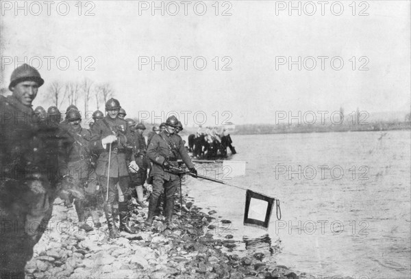 2nd Moroccan division bathes its flags in the Rhine, Huningue, Alsace, France, 21 November 1918. Artist: Unknown
