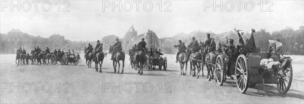 Horse-drawn artillery passing the Palace of Versailles, France, August 1914. Artist: Unknown