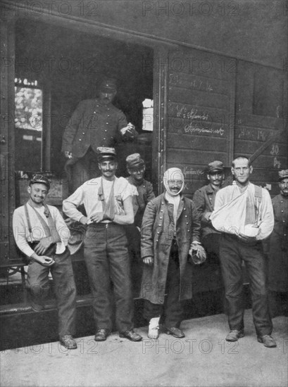 Wounded French soldiers on the way to hospital by train France, 1914. Artist: Unknown