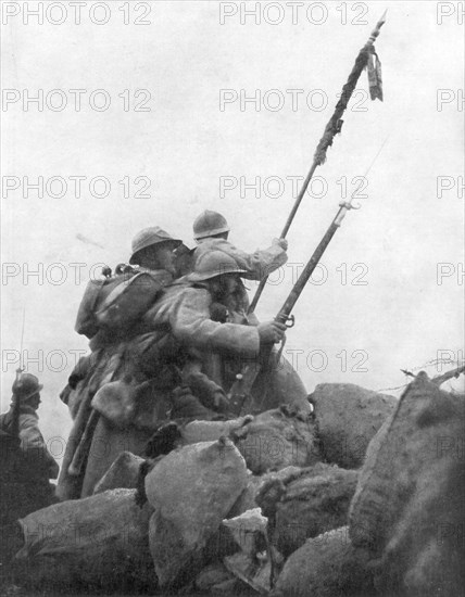 French troops with their regimental flag, the 2nd Battle of Champagne, France, 25 September 1915. Artist: Unknown