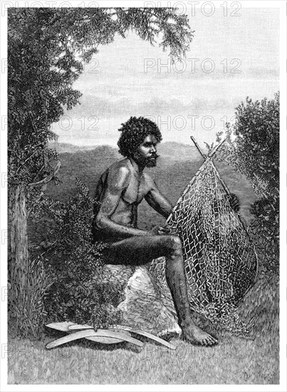 'Blackfellow Mending His Net', Australia, 1886. Artist: Unknown