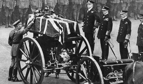 King George V places a wreath on the coffin of an unknown soldier, Whitehall, London, c1930s. Artist: Unknown