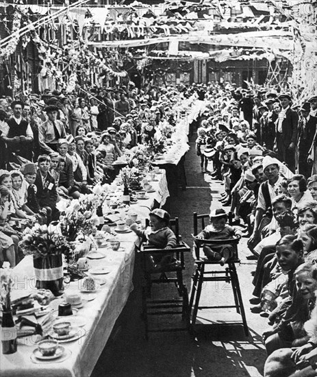 Jubilee tea party for children in Orville Road, Battersea, London, 1935. Artist: Unknown