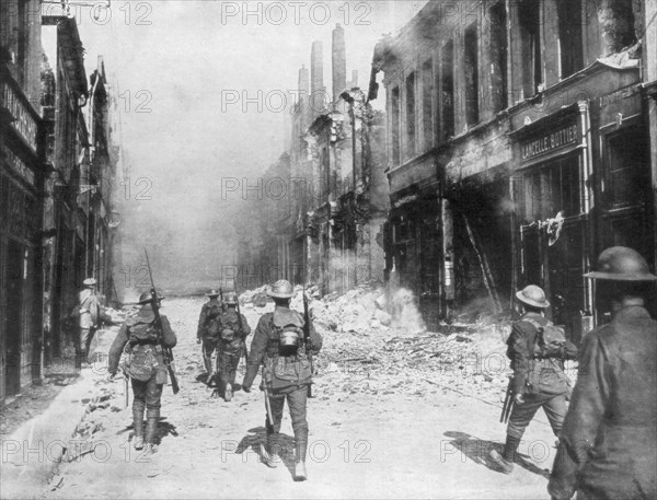 A British army patrol, Cambrai, France, First World War, 9 October 1918. Artist: Unknown