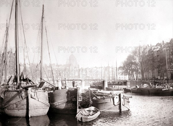 Canal boats, Rotterdam, 1898.Artist: James Batkin