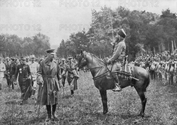 Lord Kitchener inspecting Algerian troops, France, World War I, 16 August 1915. Artist: Unknown