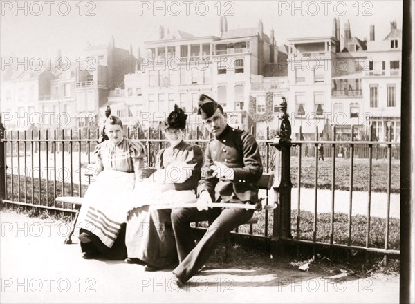 People on a bench, Rotterdam, 1898. Artist: James Batkin