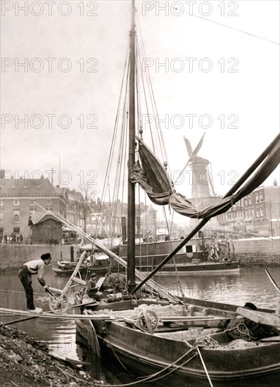 Canal boat, Rotterdam, 1898.Artist: James Batkin