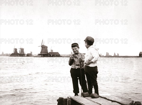 Boys by a canal, Laandam, Netherlands, 1898.Artist: James Batkin