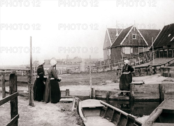 Women in traditional dress, Marken Island, Netherlands, 1898. Artist: James Batkin