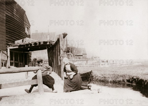 Children playing, Marken Island, Netherlands, 1898. Artist: James Batkin