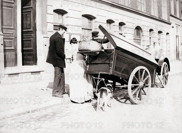 People and dogcart, Antwerp, 1898. Artist: James Batkin