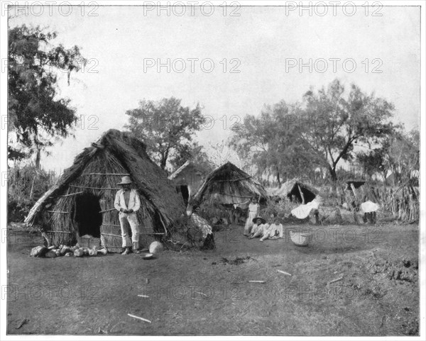 Straw cottages, Salamanca, Mexico, late 19th century.Artist: John L Stoddard