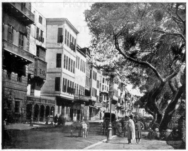 'The Ezbekiyeh and Street Scene, Cairo, Egypt', late 19th century. Artist: John L Stoddard