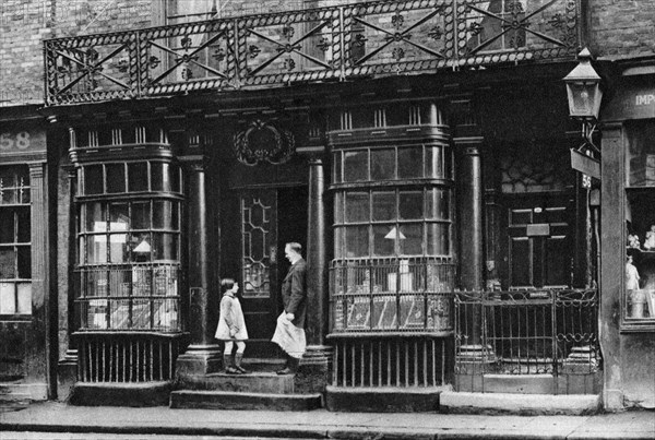 A shop front, Artillery Lane, off Bishopsgate, London, 1926-1927.Artist: McLeish