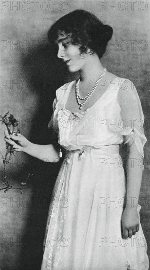 Lady Elizabeth Bowes-Lyon with a red carnation, 1923, (1937). Artist: Unknown