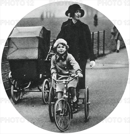 Princess Elizabeth riding a tricycle, March 1932, (1937). Artist: Unknown
