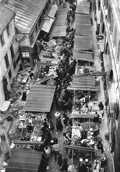 The picturesque market in Passage Berryer, Paris, 1931.Artist: Ernest Flammarion