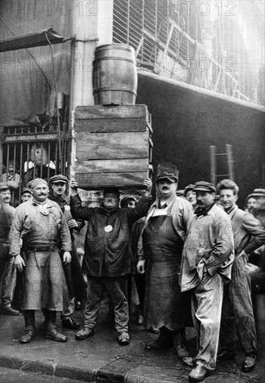 Porters at the Central Market, Paris, 1931.Artist: Ernest Flammarion