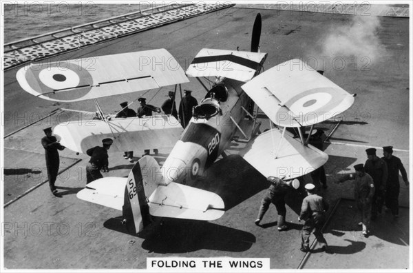 Hawker Osprey on the deck of the aircraft carrier HMS 'Eagle', 1937. Artist: Unknown