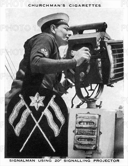 Signalman using 20 Signalling Projector, 1937.Artist: WA & AC Churchman