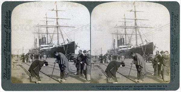 Greeting for newcomers on the pier alongside the Pacific Mail SS 'China', Yokohama, Japan, 1904.Artist: Underwood & Underwood