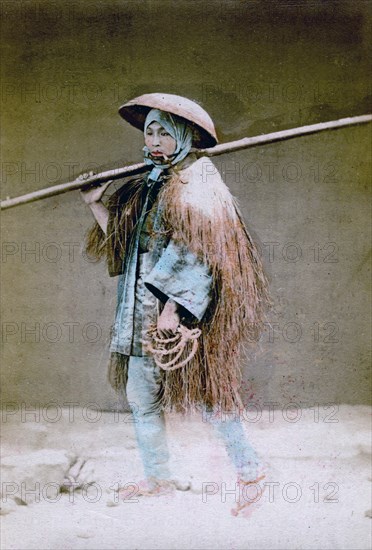 Coolie in winter dress, Japan, 1882. Artist: Felice Beato