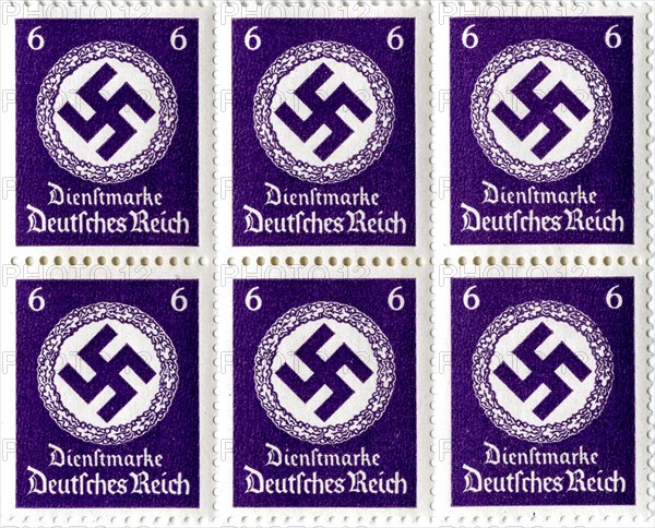 Set of postage stamps featuring a swastika emblem, 1941-1942. Artist: Unknown