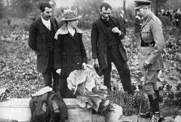 King George V admiring allotments on Clapham Common, London, c1910s-c1920s (1936). Artist: Unknown
