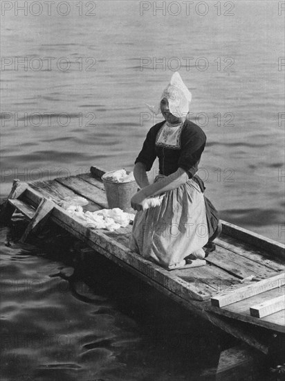 Washing in the Zuider Zee, Volendam, Netherlands, c1934. Artist: Unknown