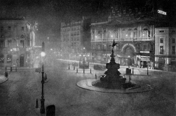 Piccadilly Circus, London, at night, 1908-1909.Artist: Charles F Borup