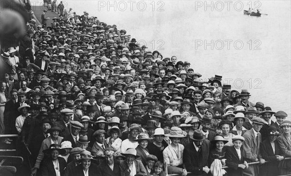 People waiting to go on a boat trip, Bournemouth Pier, August 1921. Artist: Unknown
