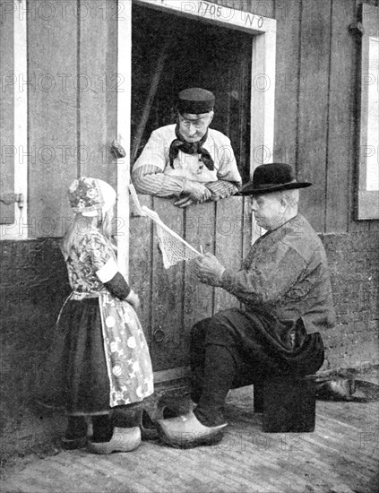 Dutch people wearing clogs, Marken, Holland, 1936.Artist: Donald McLeish