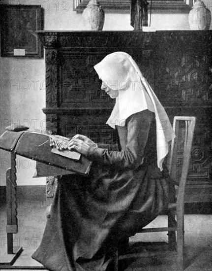 Nun making lace, Bruges, Belgium, 1936. Artist: Donald McLeish