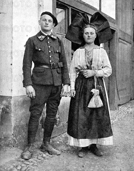 Couple in traditional dress, Alsace-Lorraine, Rhine, 1936.Artist: Donald McLeish