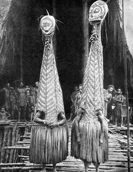 Goblin masks and visors worn as beauty aids, Papua, New Guinea, 1936.Artist: Fox Photos