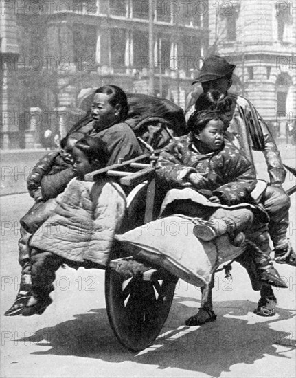 Chinese family on a cart, 1936.Artist: Sport & General