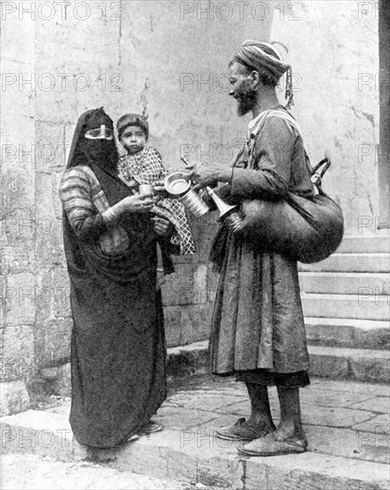 A water seller, Cairo, Egypt, 1936.Artist: Donald McLeish