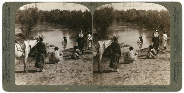 Baptising in the River Jordan, Palestine, 1903.Artist: Underwood & Underwood