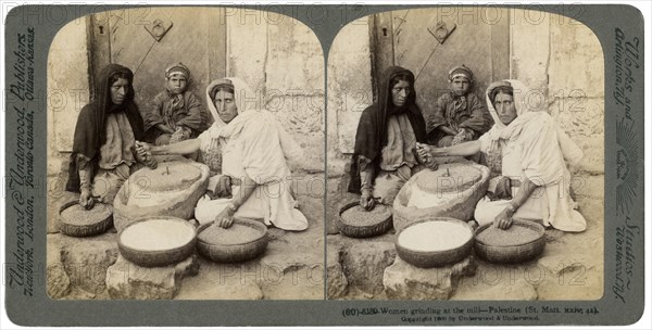 Women grinding at the mill, Palestine, 1900.Artist: Underwood & Underwood