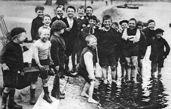 A group of summer paddlers in the Serpentine, London, 1926-1927. Artist: Unknown