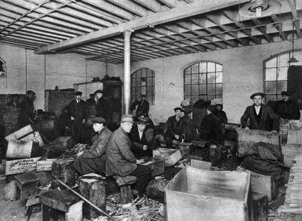 A wood-chopping workshop, London, 1926-1927. Artist: Unknown