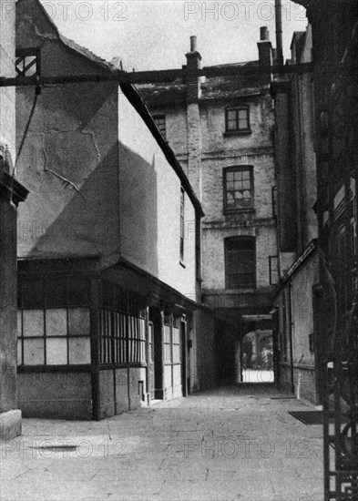 Calvert's buildings, with a courtyard typical of the old Borough High Street, London, 1926-1927.Artist: Whiffin