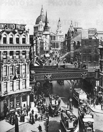 The spire of St Martin, Ludgate silhouetted against the bulk of St Paul's, London, 1926-1927. Artist: Frith