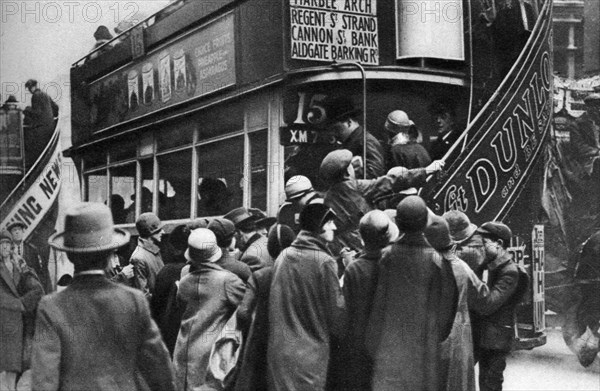 Getting on a bus in Ludgate Hill, London, 1926-1927. Artist: Unknown