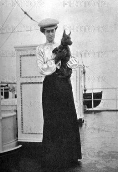 Princess Victoria (1868-1935) with Mac on board the royal yacht Victoria and Albert III, 1908.Artist: Queen Alexandra